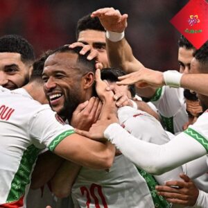 ايوب الكعبي يحتفل بالفوز على زامبيا".