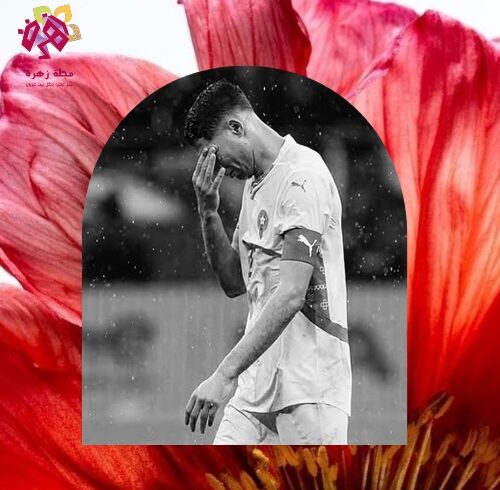 ​صورة باللونين الأبيض والأسود للاعب أشرف حكيمي بقميص المنتخب المغربي يضع يده على وجهه في لحظة تأثر وحزن بعد خسارة لقب كأس أمم إفريقيا 2025.